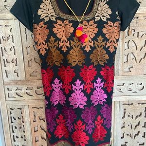 Beautiful cotton embroidered top or mini dress. Vibrant colors, beadwork, tassel